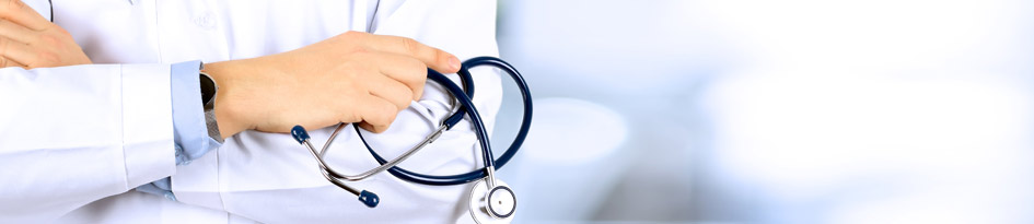 Close up of physicians hand holding stethoscope